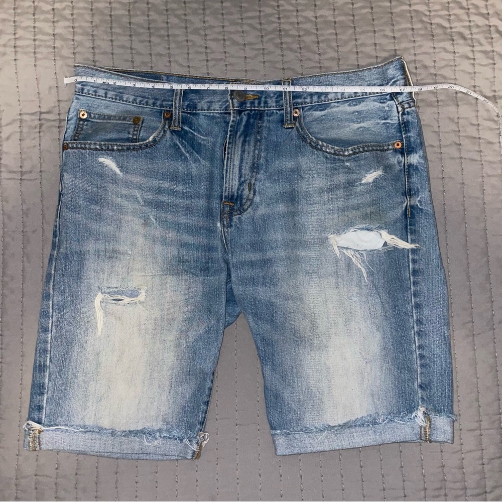 American Eagle Blue Distressed Jean Shorts with Frayed Edges